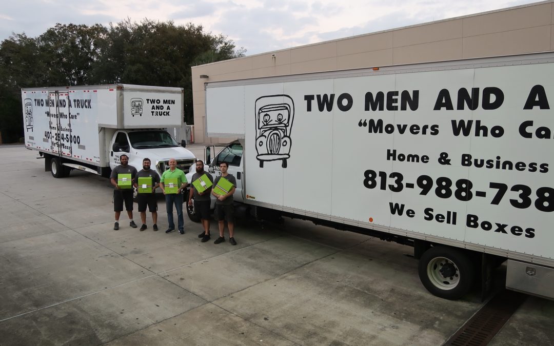 Four Men and Two Trucks